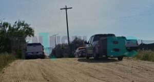 Localizan cuerpo con un impacto en la cabeza en parcela de Maneadero