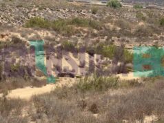 Localizan cuerpo en un hoyo en medio del arroyo en San Quintín